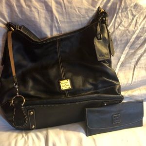 Black Dooney&Bourke bag w/ keychain & wallet.